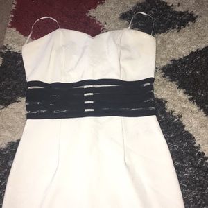 Strapless white dress with sheer panels